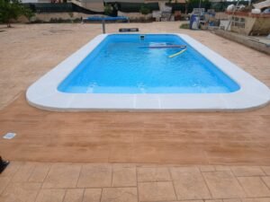 Hormigón impreso alrededor de una piscina